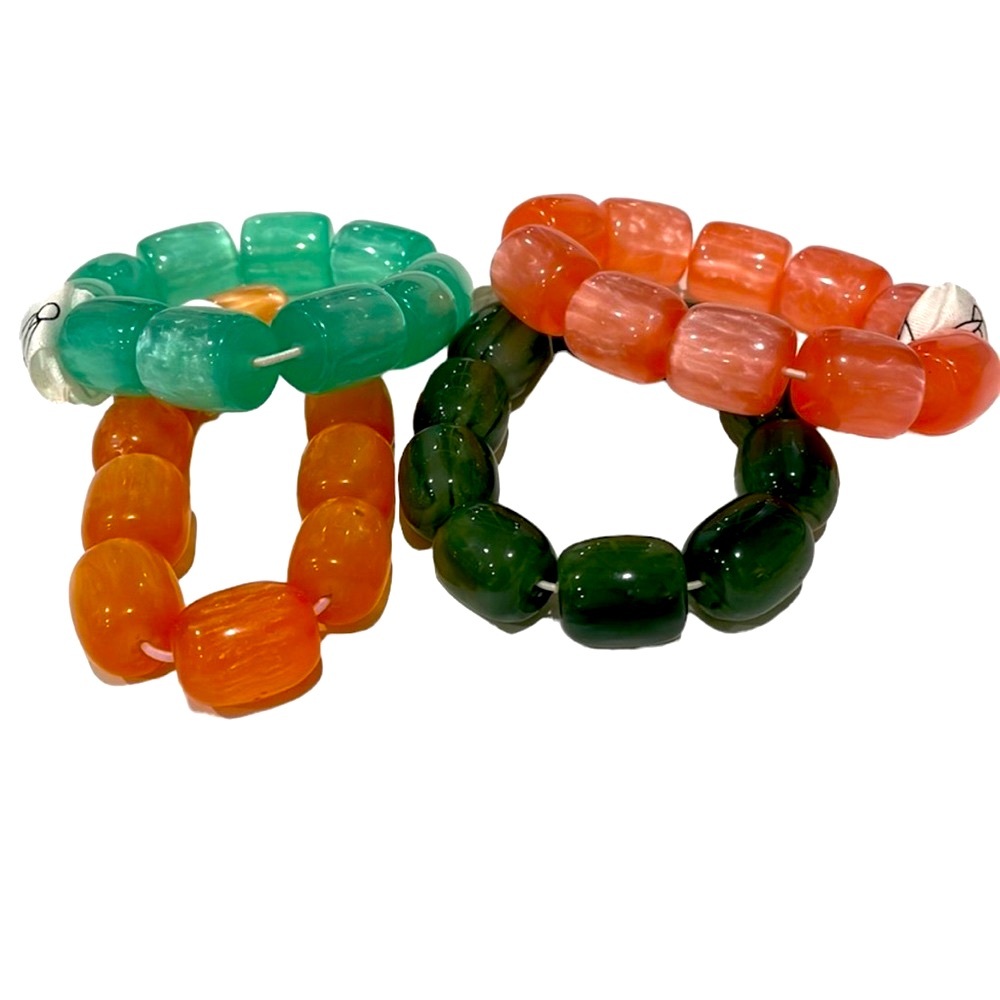 Set of four elastic beaded bracelets. NWT